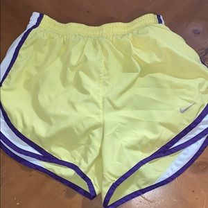 neon yellow and purple nike shorts